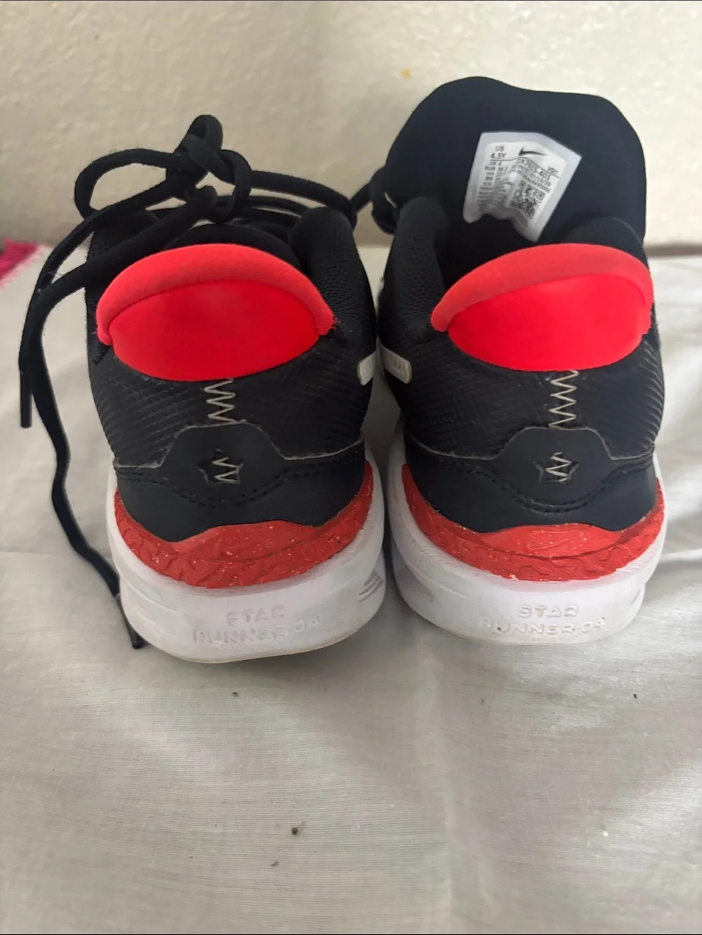 Nike Boys Sneakers in Black with White Swoosh and Red Accent